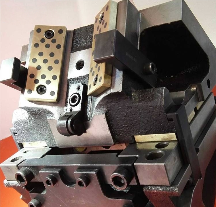 Penerapan bantalan pelumas diri dalam perkuatan mesin die-casting